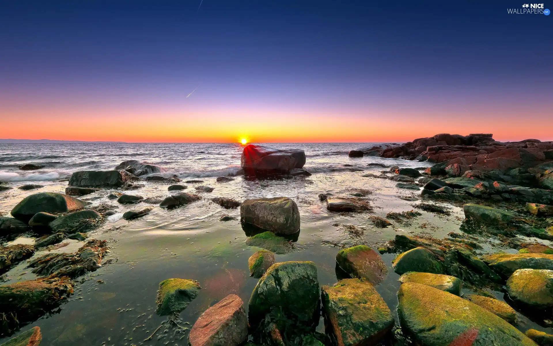 Stones, west, sun, sea